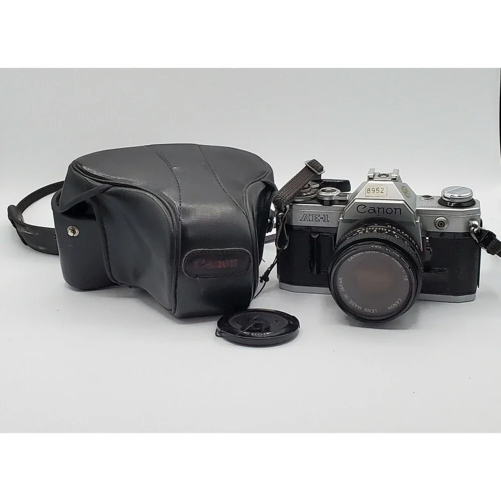 Canon AE-1 Program 35mm SLR Film Camera Bundle with 50mm, 135mm & 70-150mm Lense
